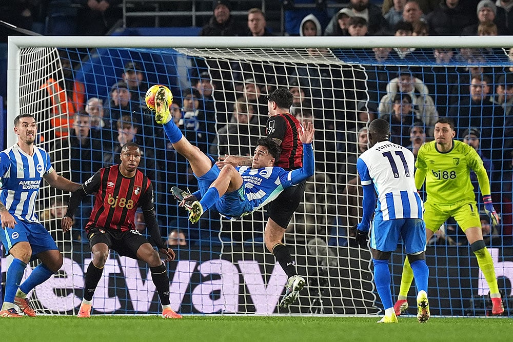 | Photo: Gareth Fuller/PA via AP : Brighton and Hove Albions Charalampos Kostoulas scores his sides first goal during the English Premier League match between Brighton & Hove Albion and AFC Bournemouth in Brighton and Hove, England.