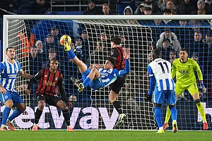 | Photo: Gareth Fuller/PA via AP : Brighton and Hove Albion's Charalampos Kostoulas scores his side's first goal during the English Premier League match between Brighton & Hove Albion and AFC Bournemouth in Brighton and Hove, England.