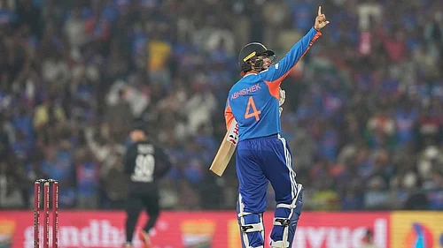 | Photo: AP/Mahesh Kumar A. : Indias Abhishek Sharma celebrates after scoring fifty runs during the first T20 cricket match between India and New Zealand in Nagpur, India.