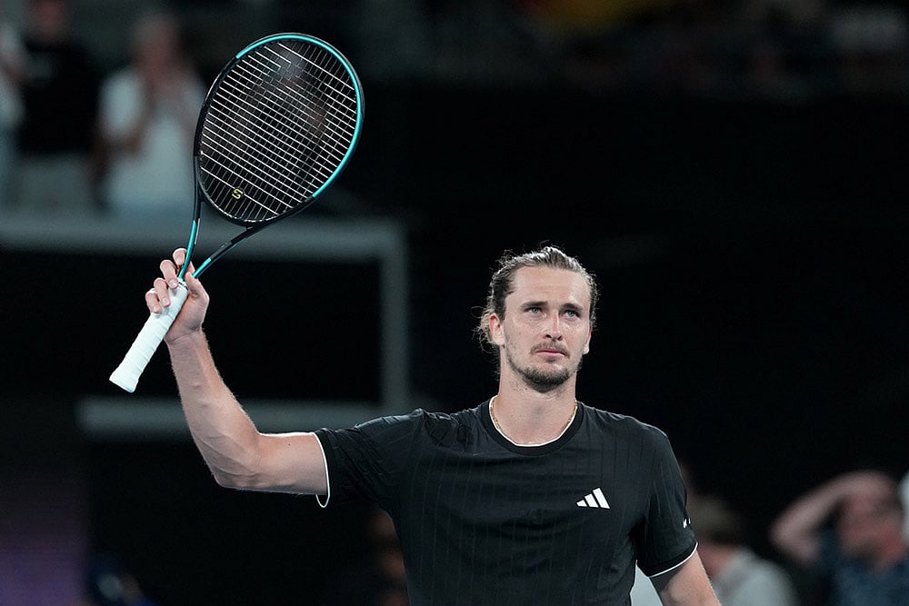 | Photo: AP/Aaron Favila : Alexander Zverev of Germany waves after defeating Alexandre Muller of France in their second round match at the Australian Open tennis championship in Melbourne, Australia.