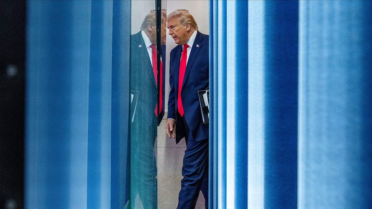 Alex Brandon/ AP : President Donald Trump arrives to speak with reporters in the James Brady Press Briefing Room at the White House, Tuesday, Jan. 20, 2026, in Washington. 