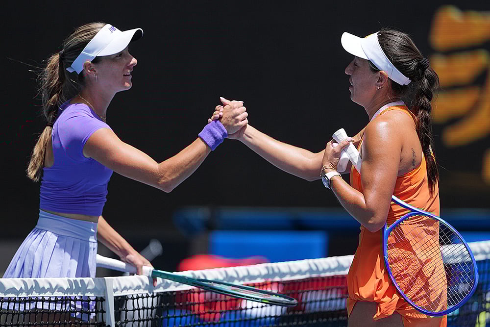 | Photo: AP/Aaron Favila : Jessica Pegula, right, of the U.S. is congratulated by compatriot McCartney Kessler, left, following their second round match at the Australian Open tennis championship in Melbourne, Australia.