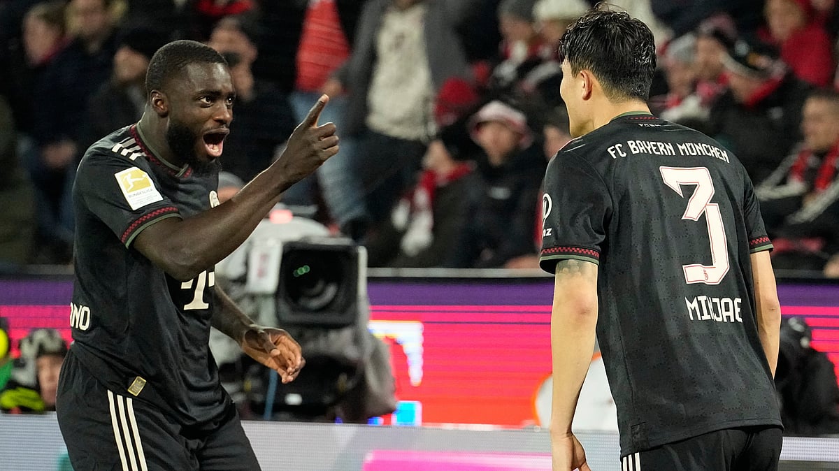 | Photo: AP/Martin Meissner : Bayern's Kim Min-jae, right, celebrates with Bayern's Dayot Upamecano after scoring his side's second goal during the German Bundesliga soccer match between 1.FC Koeln and FC Bayern Munich in Cologne, Germany, Wednesday, Jan. 14, 2026.