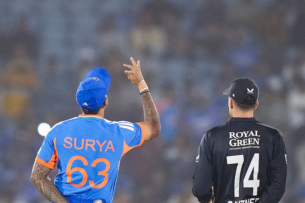 | Photo: PTI/Karma Bhutia : Indias captain Suryakumar Yadav, left, and New Zealands captain Mitchell Santner at the toss before the start of the second T20I cricket match between India and New Zealand, at Shaheed Veer Narayan Singh International Cricket Stadium, in Raipur, Chhattisgarh.