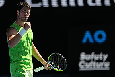 | Photo: AP/Asanka Brendon Ratnayake : Carlos Alcaraz of Spain reacts after defeating Corentin Moutet of France in their third round match at the Australian Open tennis championship in Melbourne, Australia.