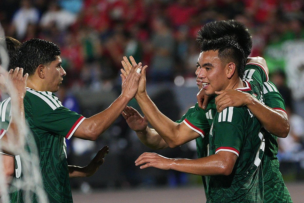 | Photo: AP/Agustin Herrera : Mexican players celebrate after Panamas Richard Peralta scored an own goal, their opening goal, during an international friendly soccer match in Panama City.