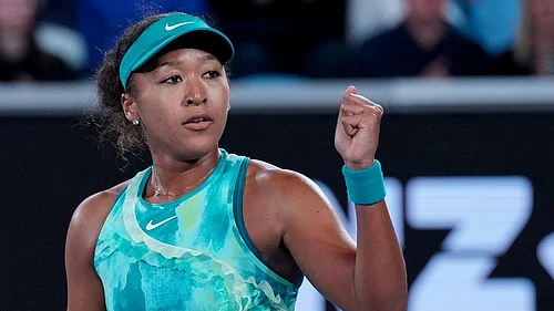 AP : Naomi Osaka of Japan reacts after defeating Sorana Cirstea of Romania in their second round match at the Australian Open tennis championship in Melbourne.
