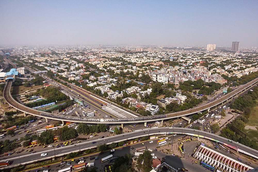 | Photo: PTI : An aerial view of the city after air quality improved following rainfall at Sector 37 in Noida, Uttar Pradesh.