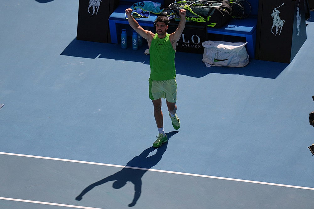 | Photo: AP/Dar Yasin : Carlos Alcaraz of Spain celebrates after defeating Tommy Paul of the U.S. during their fourth round match at the Australian Open tennis championship in Melbourne, Australia.