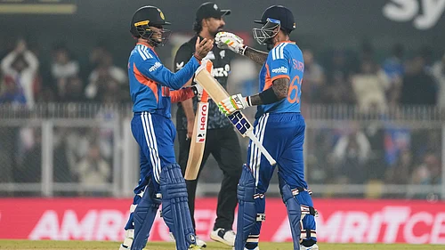 | Photo: AP/Anupam Nath : Indias captain Suryakumar Yadav, right, greets Indias Abhishek Sharma as he scores fifty run during the third T20 cricket match between India and New Zealand in Guwahati, India, Sunday, Jan. 25, 2026.