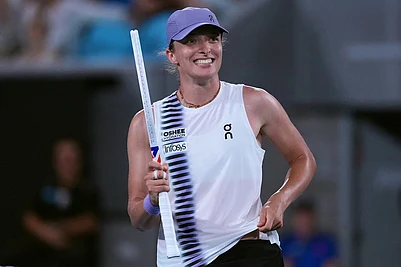 | Photo: AP/Aaron Favila : Iga Swiatek of Poland reacts after defeating Anna Kalinskaya of Russia in their third round match at the Australian Open tennis championship in Melbourne, Australia.