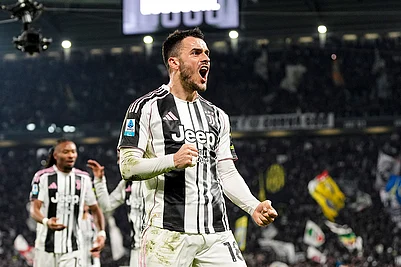 | Photo: Fabio Ferrari/LaPresse via AP : Juventus Filip Kostic celebrates scoring their sides third goal of the game during the Italian Serie A soccer match between Juventus and Napoli in Turin.