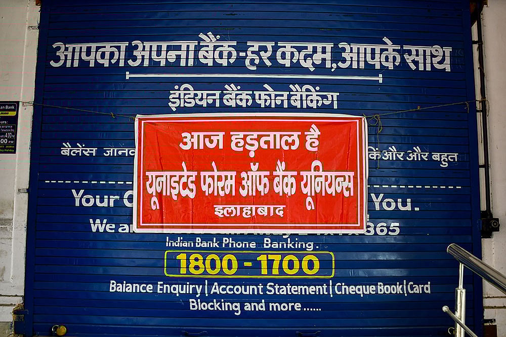 | Photo: PTI : A view of a closed bank amid nationwide strike by United Forum of Bank Unions, demanding the implementation of a five-day workweek, in Prayagraj.