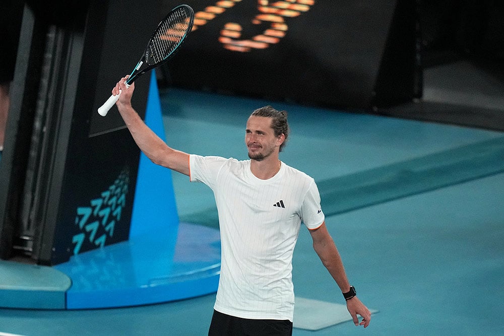 | Photo: AP/Dita Alangkara : Alexander Zverev of Germany celebrates after defeating Learner Tien of the U.S. in their quarterfinal match at the Australian Open tennis championship in Melbourne, Australia.