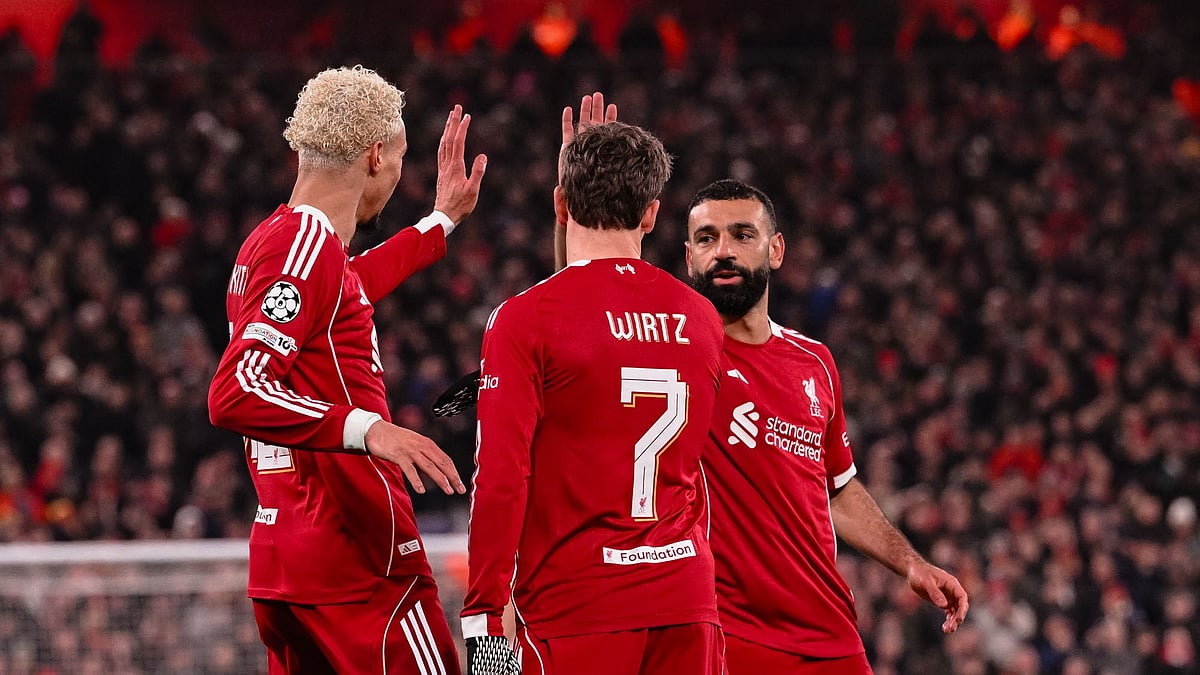LFC/X : Liverpool footballers celebrate after scoring a goal against Qarabag in UEFA Champions League 2025-26.