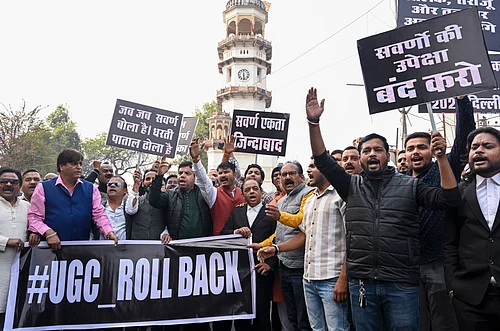 PTI : People hold placards during a protest against the University Grants Commissions recently notified Promotion of Equity in Higher Education Institutions Regulations, 2026, in Jabalpur, Wednesday, Jan. 28, 2026.