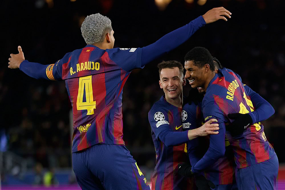 | Photo: AP/Joan Monfort : Barcelonas Marcus Rashford celebrates with team mates his sides fourth goal during the Champions League opening phase soccer match between Barcelona and Copenhagen in Barcelona, Spain.