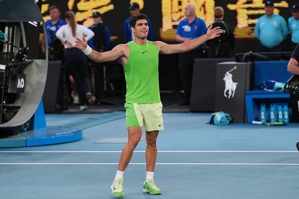 | Photo: AP/Dita Alangkara : Carlos Alcaraz of Spain celebrates after defeating Alexander Zverev of Germany in their semifinal match at the Australian Open tennis championship in Melbourne, Australia.