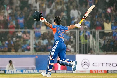 | Photo: PTI/R SenthilKumar : Indias Ishan Kishan celebrates his century during the fifth and final T20 International cricket match between India and New Zealand, at the Greenfield International Stadium, in Thiruvananthapuram, Kerala.