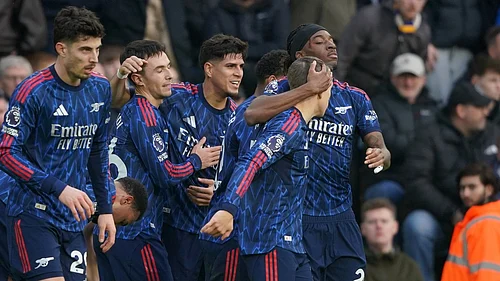 Photo: AP : Martin Zubimendi, second left, celebrates with teammates after scoring the opening goal during the English Premier League match between Leeds United and Arsenal in Leeds.