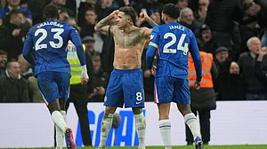 Photo: AP : Enzo Fernandez, centre, celebrates after scoring his side's third goal during the English Premier League match between Chelsea and West Ham United in London.