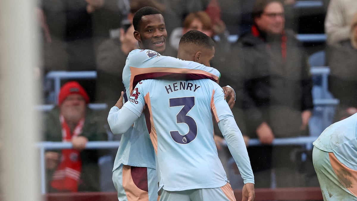Dango Ouattara celebrates with Rico Henry after scoring at Villa Park.