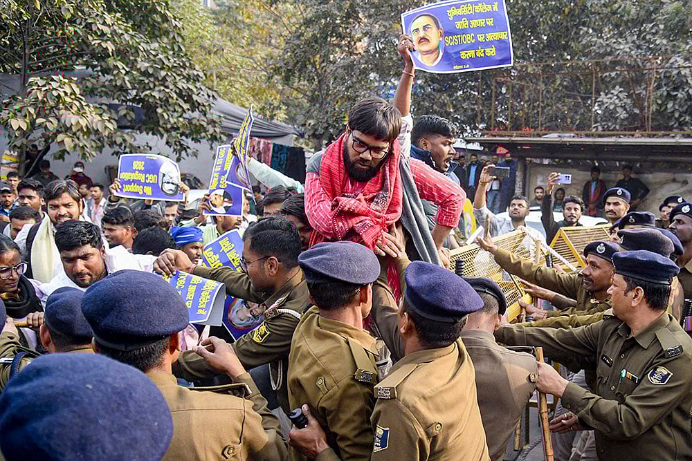 | Photo: PTI : Police detain students of Patna University during a Justice March held in support of the UGC Regulations 2026, in Patna.
