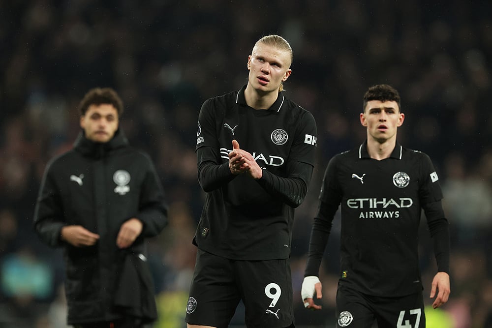 | Photo: AP/Richard Pelham : Manchester Citys Erling Haaland, center, and Phil Foden leave the pitch after the English Premier League soccer match between Tottenham Hotspur and Manchester City in London.