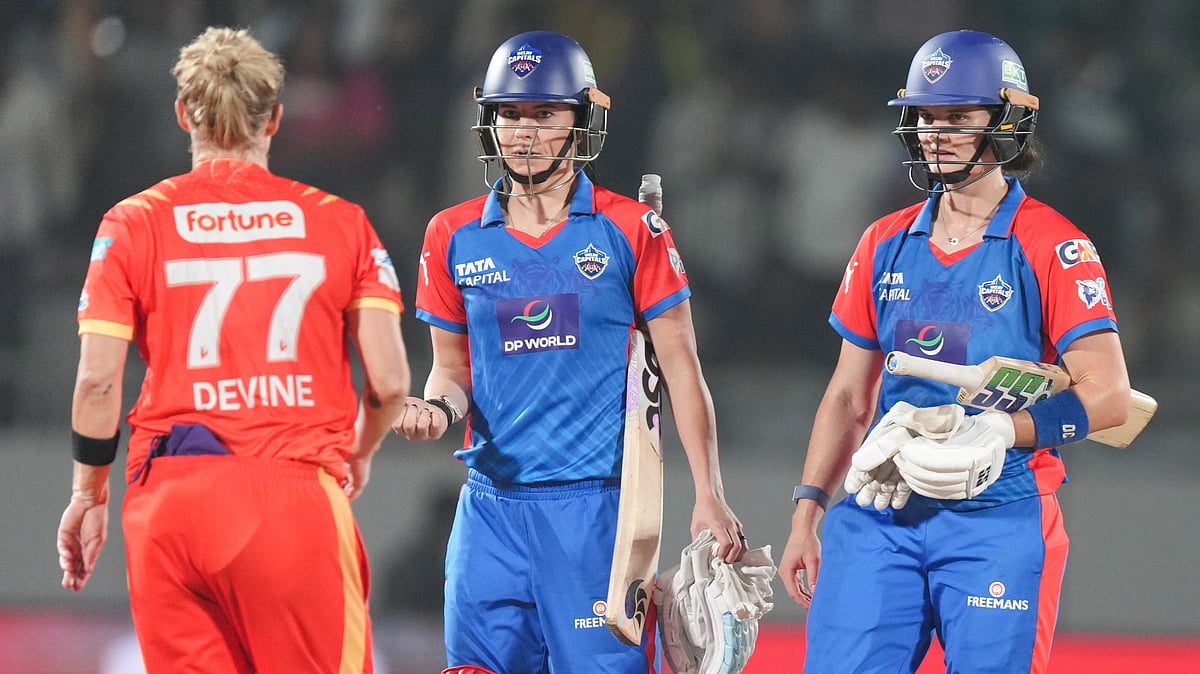 PTI : Marizanne Kapp (centre) and Laura Wolvaardt (right) interact with Sophie Devine after Delhi Capitals win against Gujarat Giants in the Womens Premier League 2026 Eliminator in Vadodara.