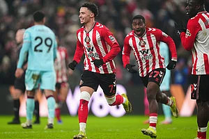 | Photo: Owen Humphreys/PA via AP : Sunderland's Chemsdine Talbi, left, celebrates scoring their side's third goal of the game during the Premier League soccer match against Burnley, at the Stadium of Light, in Sunderland, England.