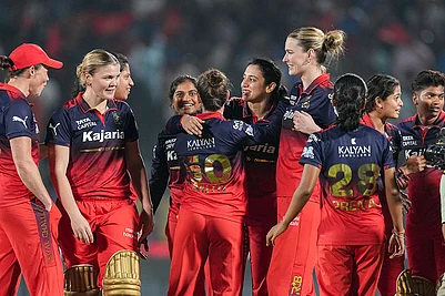 | Photo: PTI/Kunal Patil : Royal Challengers Bengalurus players celebrate after the team won the Womens Premier League (WPL) 2026 final T20 cricket match against Delhi Capitals, at Baroda Cricket Association Stadium, Kotambi in Vadodara, Gujarat.