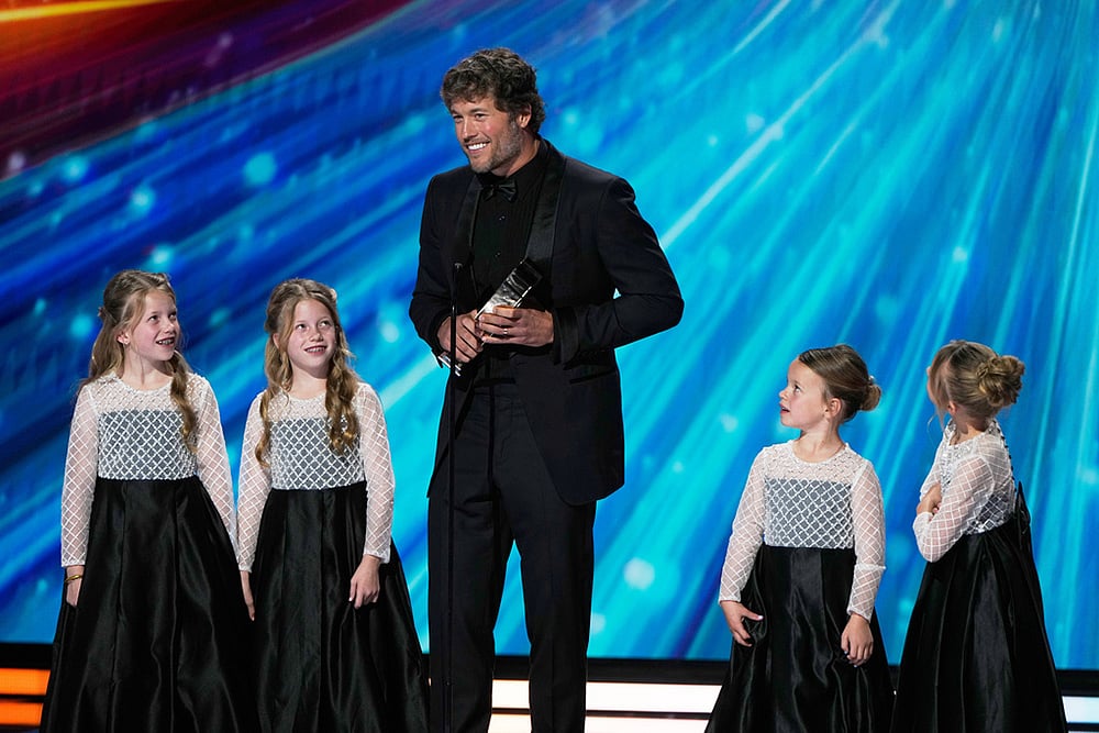 | Photo: AP/Charlie Riedel : Los Angeles, Rams Matthew Stafford accepts the AP Most Valuable Player award during the NFL Honors award show in San Francisco. 