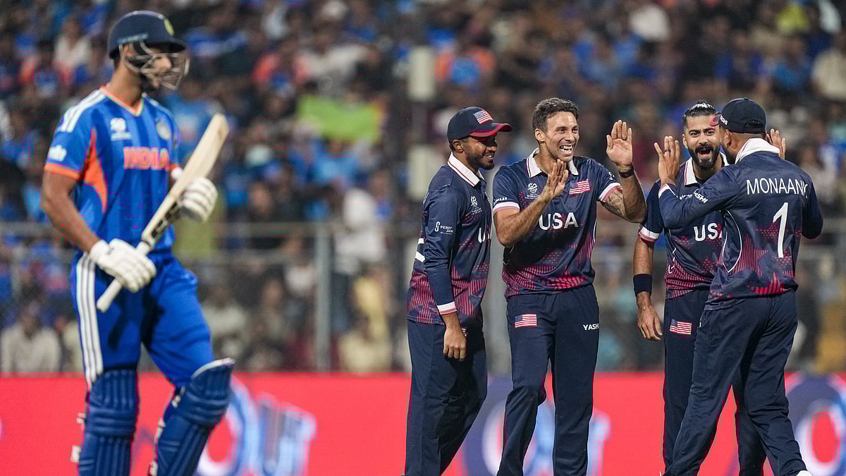 (PTI Photo/Kunal Patil) : USAs players celebrate the dismissal of Indias Shivam Dube during the ICC Mens T20 World Cup 2026 cricket match between India and USA, at the Wankhede Stadium, in Mumbai, Saturday, Feb. 7, 2026. 