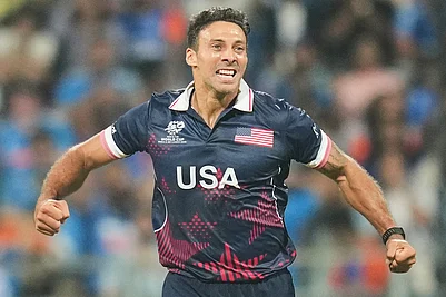 | Photo: AP/Rafiq Maqbool : United States Shadley Van Schalkwyk Indias Shivam Dube during the T20 World Cup cricket match between India and the United States in Mumbai.