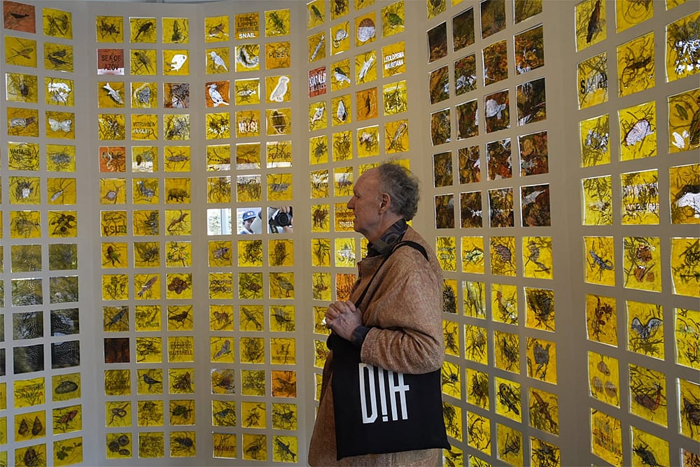 | Photo: Vikram Sharma/Outlook : Art enthusiast watch the work of Kulpreet Singh titled Extinction Archive on the agricultural and farming practices in the aftermath of the green revolution 