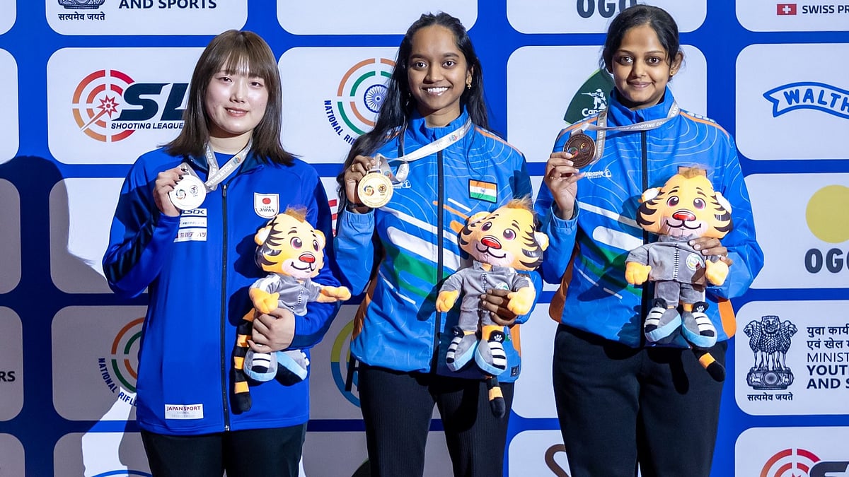 X/NRAI : Indias Meghana Sajjanar (right) and Elavenil Valarivan (centre) on the podium after bagging bronze and gold medals at the Asian Championship 2026s women’s 10m air rifle event.