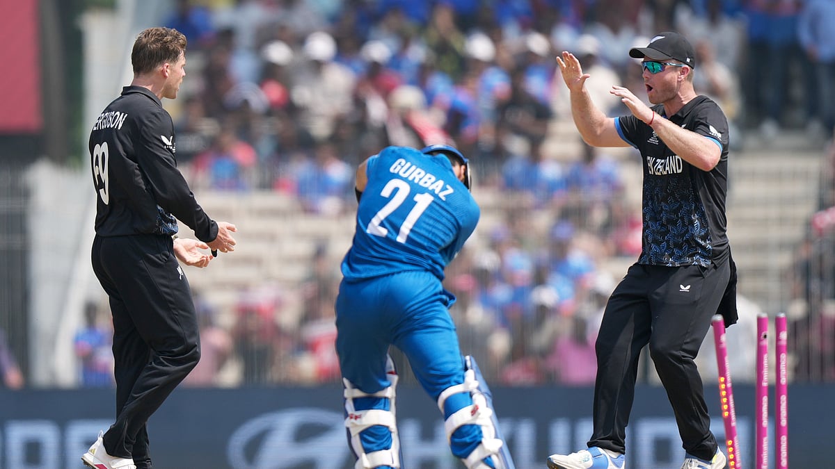  (AP Photo/Mahesh Kumar A.) : Afghanistans Rahmanullah Gurbaz, center, is bowled out by New Zealands Lockie Ferguson, left, during the T20 World Cup cricket match between Afghanistan and New Zealand in Chennai, India, Sunday, Feb. 8, 2026.