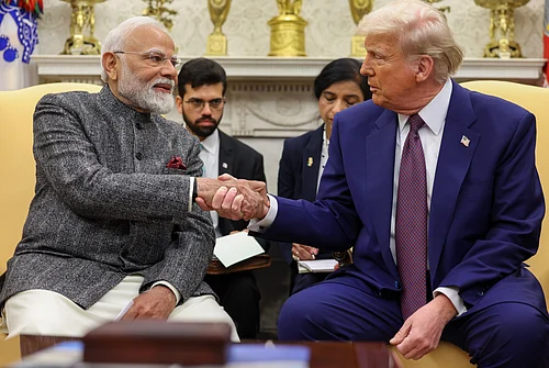 PTI : In this image released by PMO on Friday, Feb. 14, 2025, Prime Minister Narendra Modi during a meeting with US President Donald Trump at the White House, in Washington, DC, USA. India and the US on Saturday, Feb. 7, 2026, announced they have reached a framework for an interim trade agreement under which both sides will reduce import duties on a number of goods to boost two-way trade