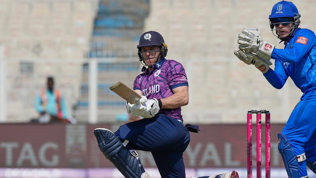 (AP Photo/Bikas Das) : Scotlands captain Richie Berrington plays a shot during the T20 World Cup cricket match between Italy and Scotland in Kolkata, India, Monday, Feb. 9, 2026
