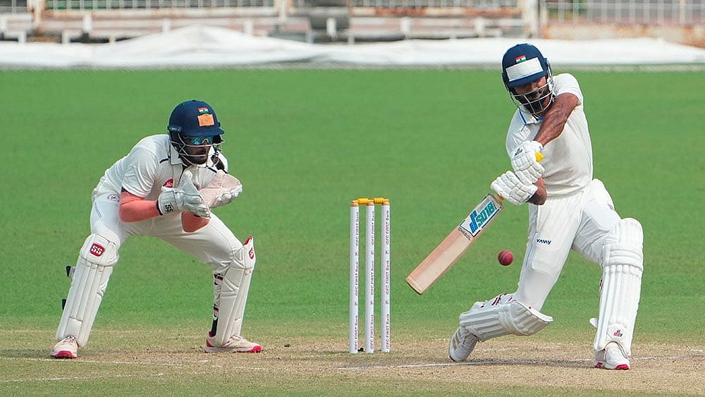 | Photo: PTI/Swapan Mahapatra : Bengals Akash Deep plays a shot during the fourth day of the Ranji Trophy 2025-26 cricket match between Bengal and Gujarat, at Eden Gardens, in Kolkata.