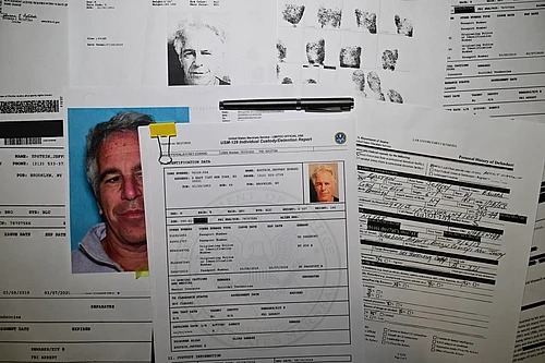 IMAGO / SOPA Images : Released documents from disgraced late financier and sex offender Jeffrey Epstein, referencing court cases against him, are seen in the handouts released by the U.S. Justice Department.