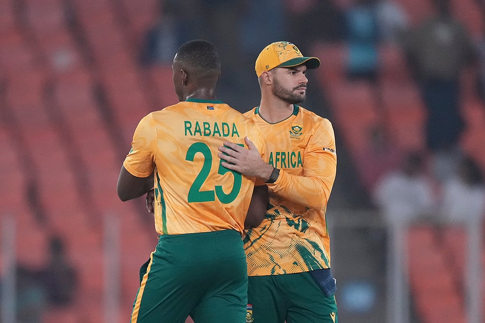 | Photo: AP/Ajit Solanki : South Africas captain Aiden Markram, right, and South Africas Kagiso Rabada after wining against Canada during the T20 World Cup cricket match in Ahmedabad.