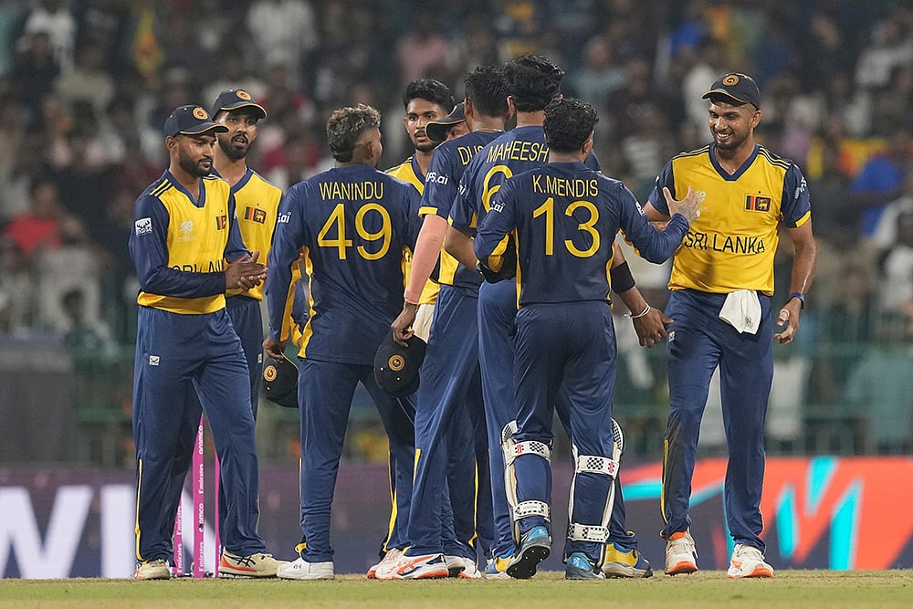| Photo: AP/Eranga Jayawardena : Sri Lankas players celebrate after won the match during the T20 World Cup cricket match between Sri Lanka and Ireland in Colombo, Sri Lanka.