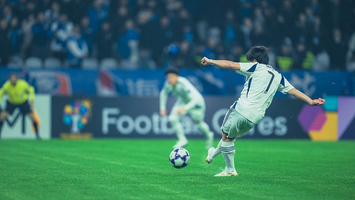 Photo: Machida Zelvia : Yuki Soma converts from the penalty spot during the Shanghai Shenhua FC vs Machida Zelvia clash in the AFC Champions League Elite.