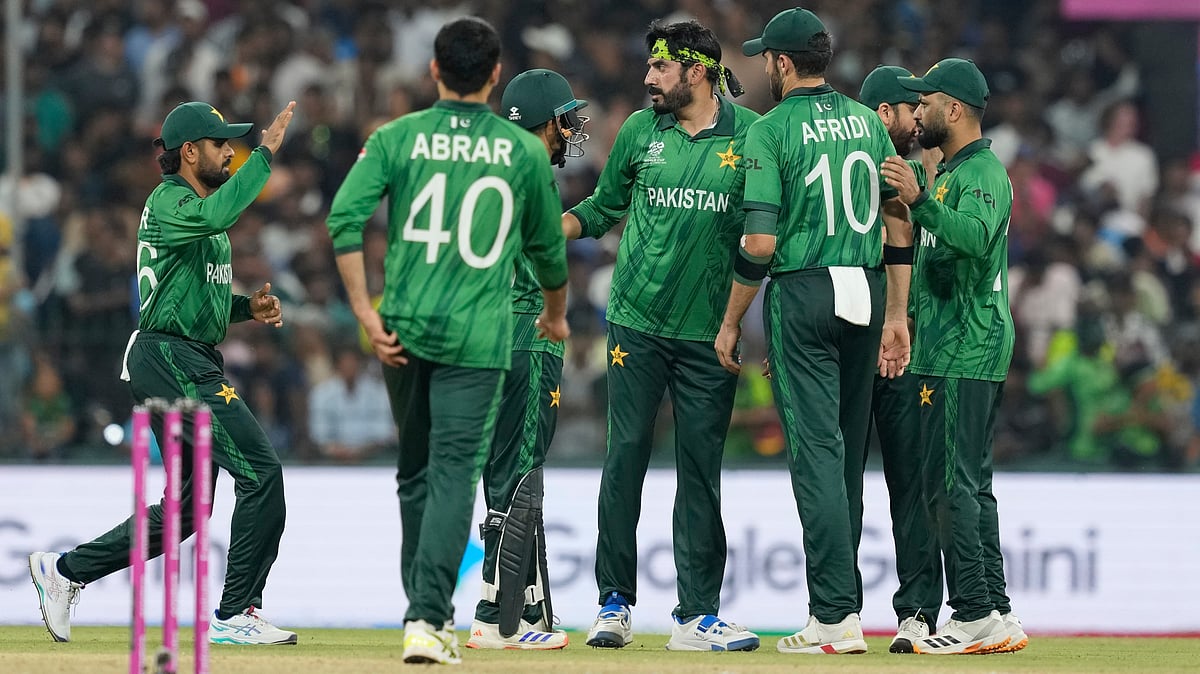 (AP Photo/Eranga Jayawardena) : Pakistans Usman Tariq, centre, celebrates with teammates the wicket of United States Milind Kumar during the T20 World Cup cricket match between Pakistan and the United States in Colombo, Sri Lanka, Tuesday, Feb. 10, 2026