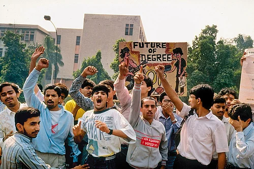 Past Protest: Students protesting in 1990 against the recommendations of the Mandal Commission for quotas in government jobs for backward castes with signs including anti-PM V. P. Singh