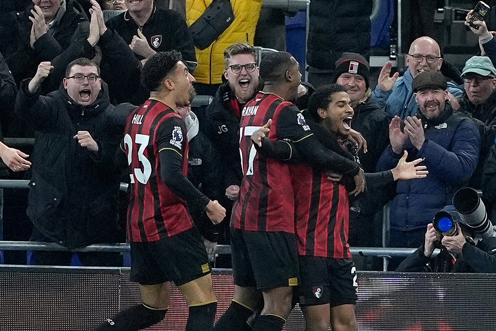 | Photo: Peter Byrne/PA via AP : Bournemouths Amine Adli, right, celebrates scoring their sides second goal of the game Everton during their English Premier League soccer match in Liverpool, England.