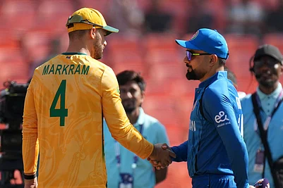 | Photo: AP/Ajit Solanki : Afghanistans captain Rashid Khan and South Africas captain Aiden Markram, left shake hand after the toss during the T20 World Cup cricket match between Afghanistan and South Africa in Ahmedabad.