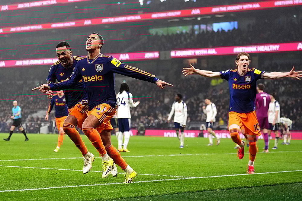 | Photo: John Walton/PA via AP : Newcastle Uniteds Jacob Ramsey, second from left, celebrates scoring their sides second goal against Tottenham during a Premier League soccer match London. 