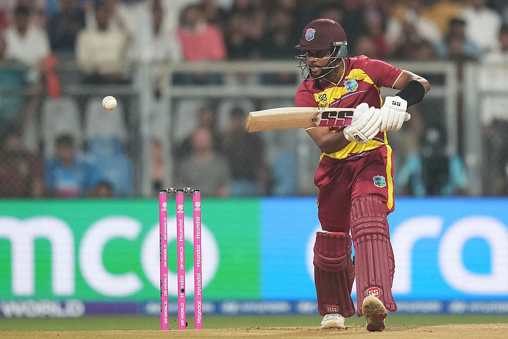 | Photo: AP/Rafiq Maqbool : West Indies Brandon King plays a shot during the T20 World Cup cricket match between England and West Indies in Mumbai, India.
